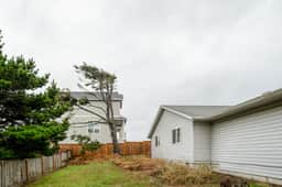 Cozy dog friendly getaway one block from beach with fireplace and gas grill