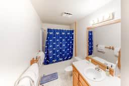 Cozy dog friendly getaway one block from beach with fireplace and gas grill