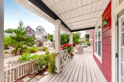 Romantic Oregon Coast Escape with Porch, Fireplace & Garden Charm