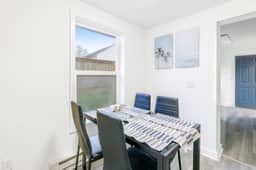 Ocean view home with pool table and fast WiFi steps to beach shops and eateries