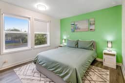 Ocean view home with pool table and fast WiFi steps to beach shops and eateries