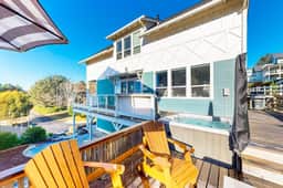 Beautiful family friendly home with private hot tub walk to beach shared pool