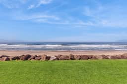 Beautiful ocean front condo with stunning views WiFi steps to beach