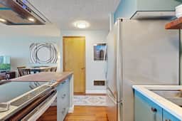 Beachfront condo boasting beautiful views a private balcony and perfect location