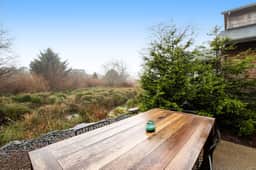 New Family Friendly Home with a Furnished Patio and Tranquil Yard