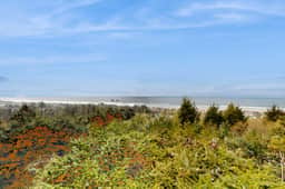Spacious family home near the beach with ocean view large deck free WiFi and more
