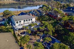 Renovated lake ocean view retreat with hot tub outdoor living and fireplace