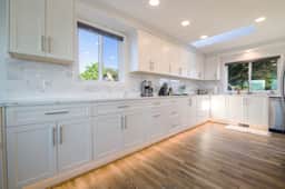 Renovated lake ocean view retreat with hot tub outdoor living and fireplace