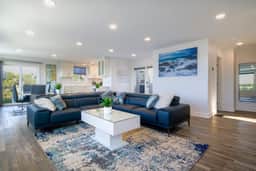 Renovated lake ocean view retreat with hot tub outdoor living and fireplace