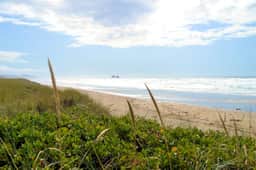 Oceanfront home with a washer dryer and beach access