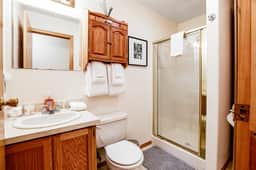 Lake view getaway steps from beach with WiFi and private washer dryer