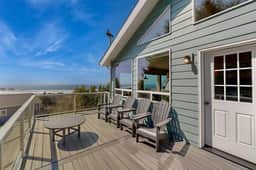 Family friendly ocean view home with spacious deck walk to beach books and games