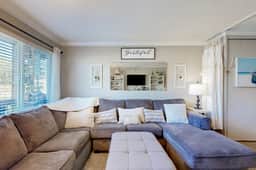 Creekfront Condo with Private Patio Beach Access Shared with D Gas Grill and Views