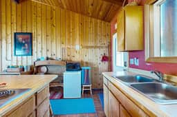 Ocean front home with spacious deck and beach access near shops and restaurants