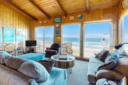 Ocean front home with spacious deck and beach access near shops and restaurants