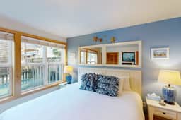 Coastal home walking distance to the beach with outdoor shower and fireplace