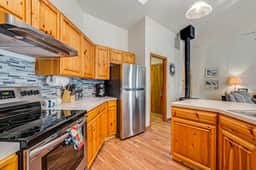 Cozy Home with Wood Stove WiFi Gas Grill and Large Deck Walk to Beach
