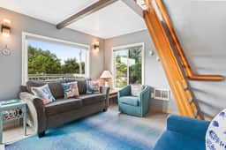 Dog friendly home across street from beach with rooftop deck and views