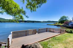 Dog Friendly Lakefront Vacation Home with Stunning Views and Spacious Deck