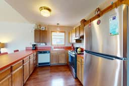 Mid century modern styled home with patio WiFi washer dryer walk to beach