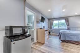 Two Dog Friendly Studios with Full Kitchen and Kitchenette Walk to the Beach