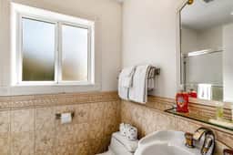 Waterfront dog friendly home a few steps from the beach with hot tub
