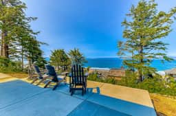 Spacious ocean view home with wood fireplace grill and deck dog friendly