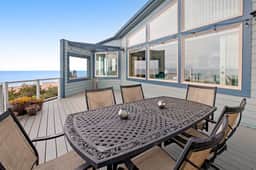 Ocean view home with a deck gas grill free WiFi and washer dryer