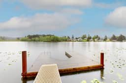 Lakefront townhome with electric grill firepit ping pong table and shared dock