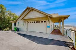 Ocean view home with heated floors private hot tub and multiple decks