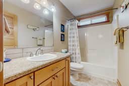 Family friendly home with private hot tub fireplace and BBQ close to beach