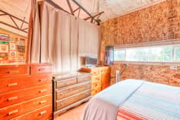 Incredibly Unique Bar Inspired Home with Private Hot Tub and near the Beach Dogs OK