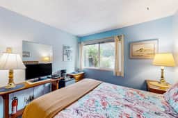 Dog friendly riverfront suite at oceanfront Proposal Rock Inn steps to beach