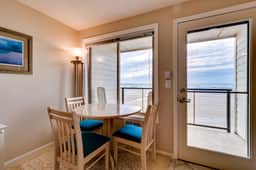 Oceanfront condo with a full kitchen balcony and sweeping sea views