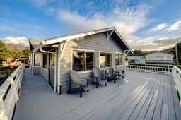 Homey dog friendly house with partial ocean views gas fireplaces and gas grill