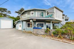 Unique and spacious home with private hot tub game room and great ocean views