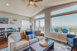 Sweeping ocean view home with fireplace grill and foosball table dog friendly