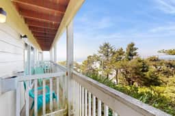 Lower Level Dog Friendly Studio with Ocean Views and Free WiFi Walk to Beach