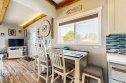 Charming modern home close to the beach with full kitchen WiFi and large deck