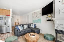 Charming dog friendly waterfront beach home with lovely patio