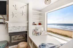 Charming dog friendly waterfront beach home with lovely patio