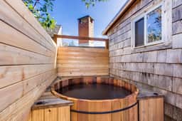 Quiet Coastal Cabin Home with Private Hot Tub Less Than a Block From Beach