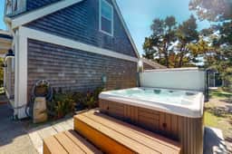 Dog friendly beach house with private hot tub free WiFi game room and ocean views