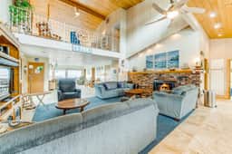 Spacious family home with ocean view balcony deck and fireplace dogs OK