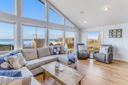 Bright home with stunning ocean views private hot tub and nearby beach access