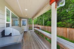 Dog friendly home with enclosed yard game room private hot tub near the beach