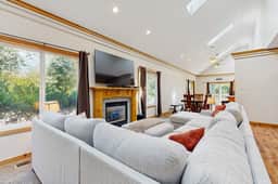Expansive family friendly home with a private hot tub walk to the beach