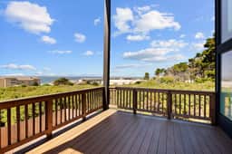 Spacious home with ocean view enclosed yard fireplace hut tub washer and dryer