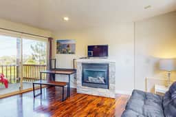 Dog Friendly Condo with Partial Ocean Views Short Walk to the Beach