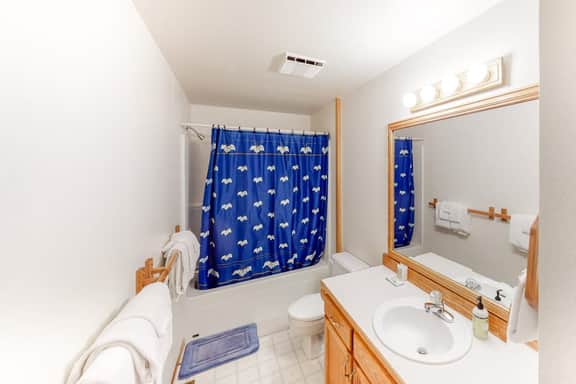Cozy dog friendly getaway one block from beach with fireplace and gas grill